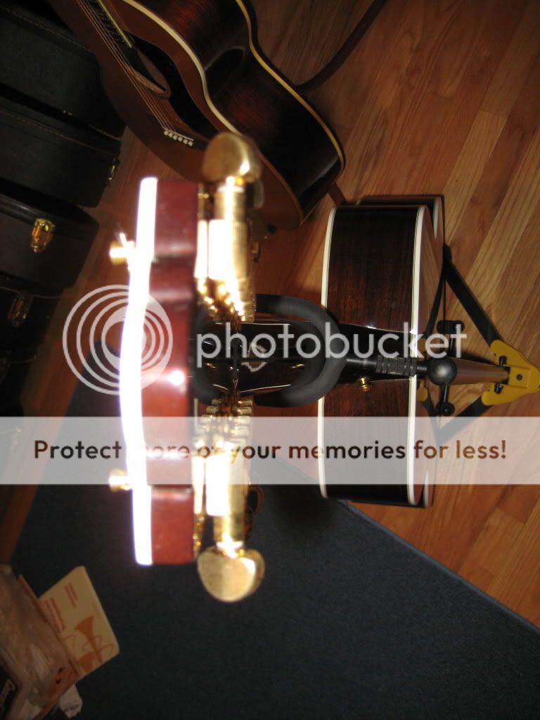 Anyone install a strap button on a Guild D40 ? The Acoustic Guitar Forum